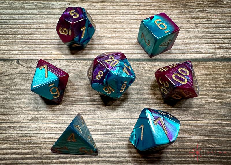 CHX26449 - Chessex: Gemini Purple-Teal/gold Polyhedral 7-Dice Set