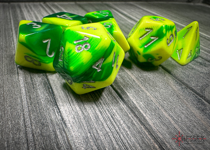 CHX26454 - Chessex: Gemini Green-Yellow/silver Polyhedral 7-Dice Set