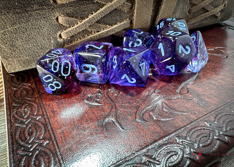 CHX27557 - Chessex: Nebula Nocturnal/blue Luminary Polyhedral 7-Dice Set