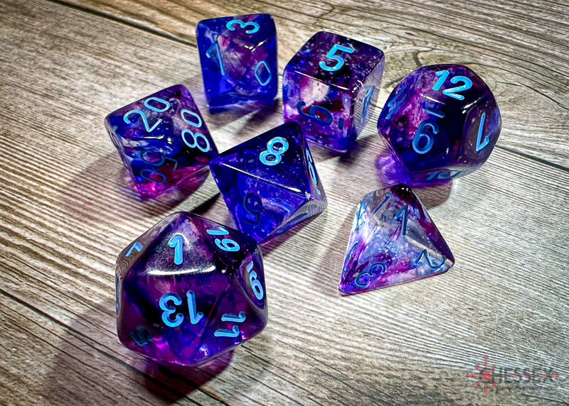 CHX27557 - Chessex: Nebula Nocturnal/blue Luminary Polyhedral 7-Dice Set