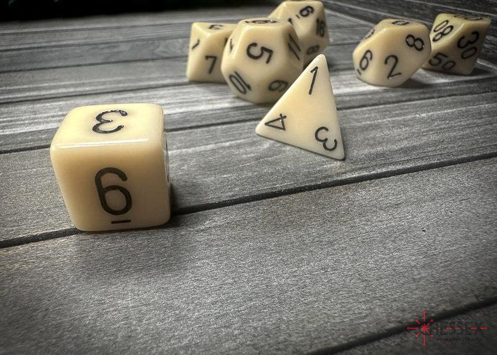 CHX25400 - Chessex: Opaque Ivory/black Polyhedral 7-Dice Set