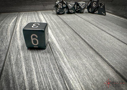 CHX25408 - Chessex: Opaque Black/white Polyhedral 7-Dice Set
