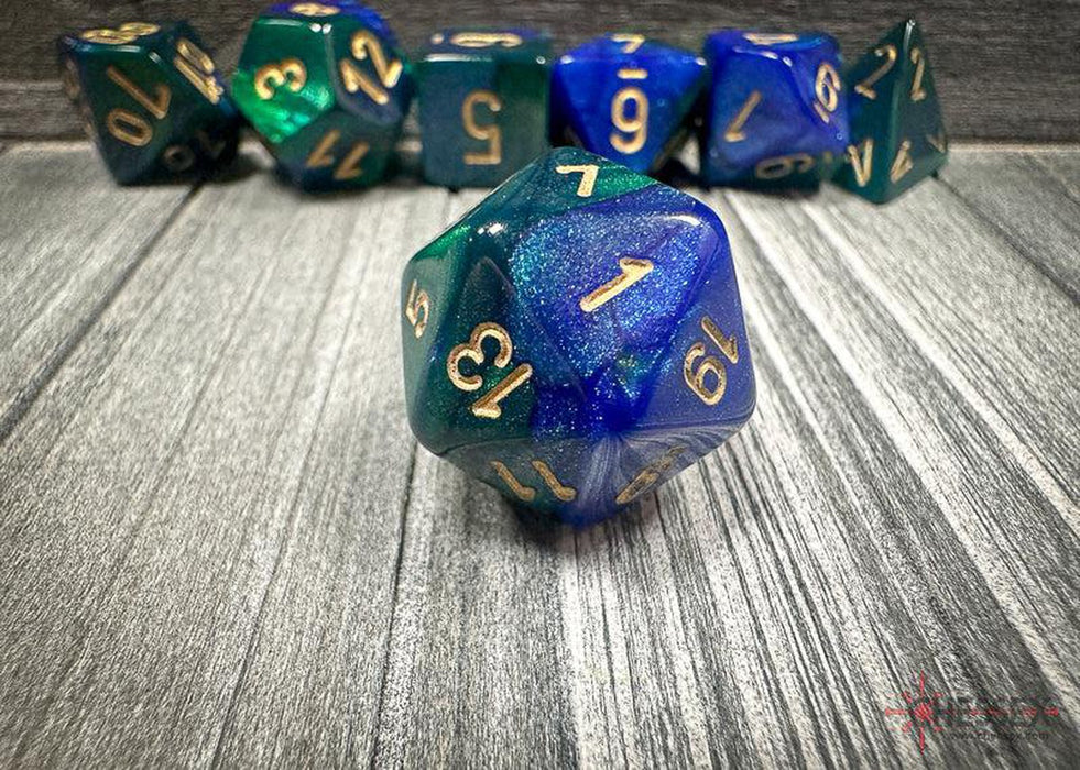 CHX26436 - Chessex: Gemini Blue-Green/gold Polyhedral 7-Dice Set