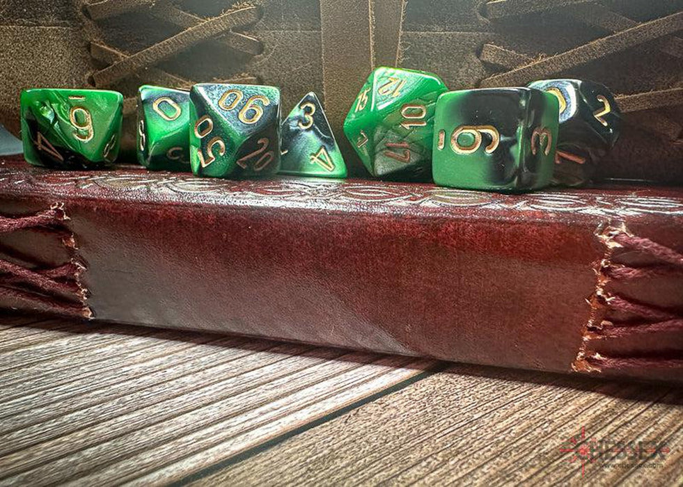 CHX26439 - Chessex: Gemini Black-Green/gold Polyhedral 7-Dice Set
