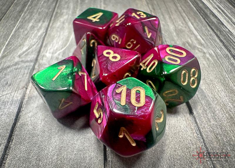 CHX26434 - Chessex: Gemini Green-Purple/gold Polyhedral 7-Dice Set