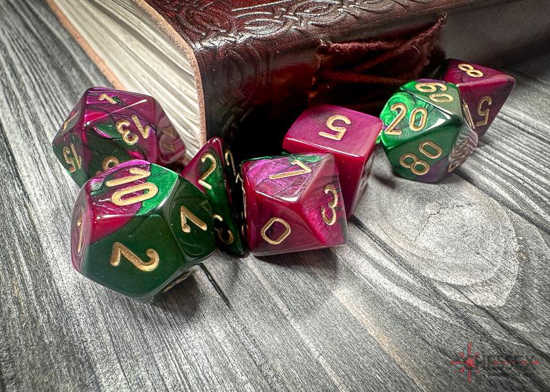 CHX26434 - Chessex: Gemini Green-Purple/gold Polyhedral 7-Dice Set