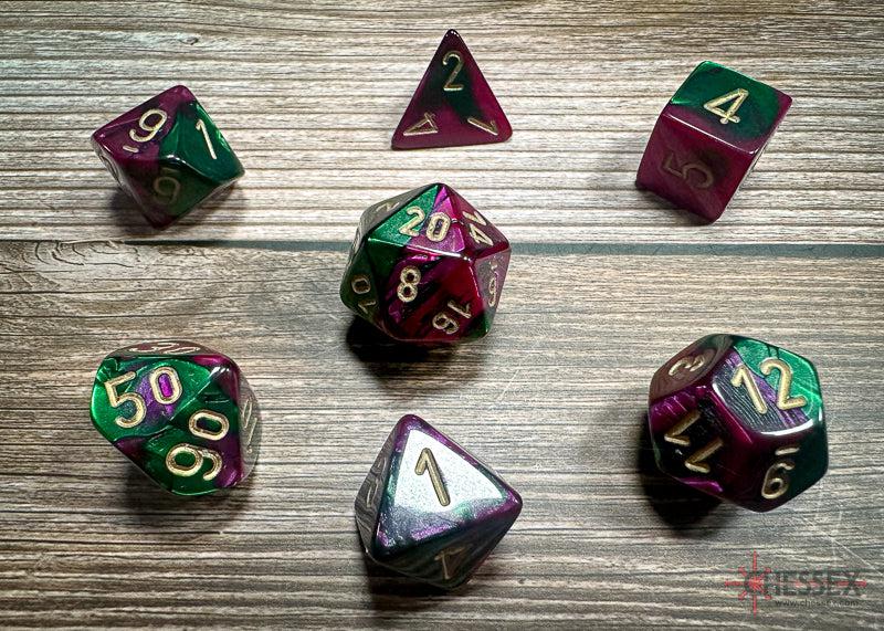 CHX26434 - Chessex: Gemini Green-Purple/gold Polyhedral 7-Dice Set