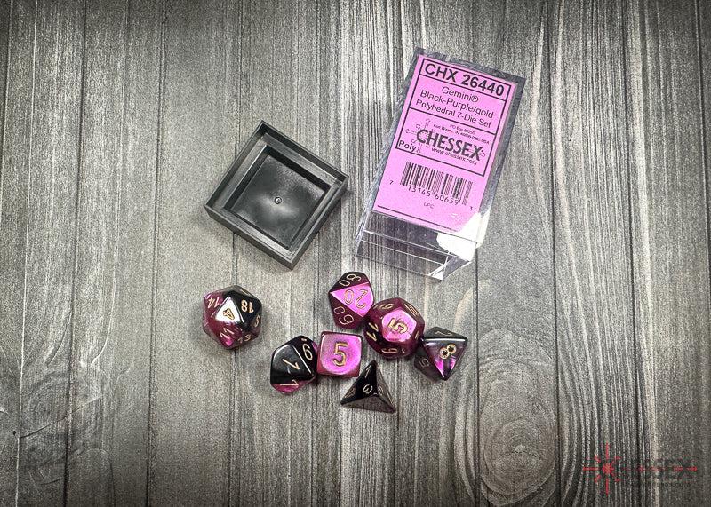 CHX26440 - Chessex: Gemini Black-Purple/gold Polyhedral 7-Dice Set