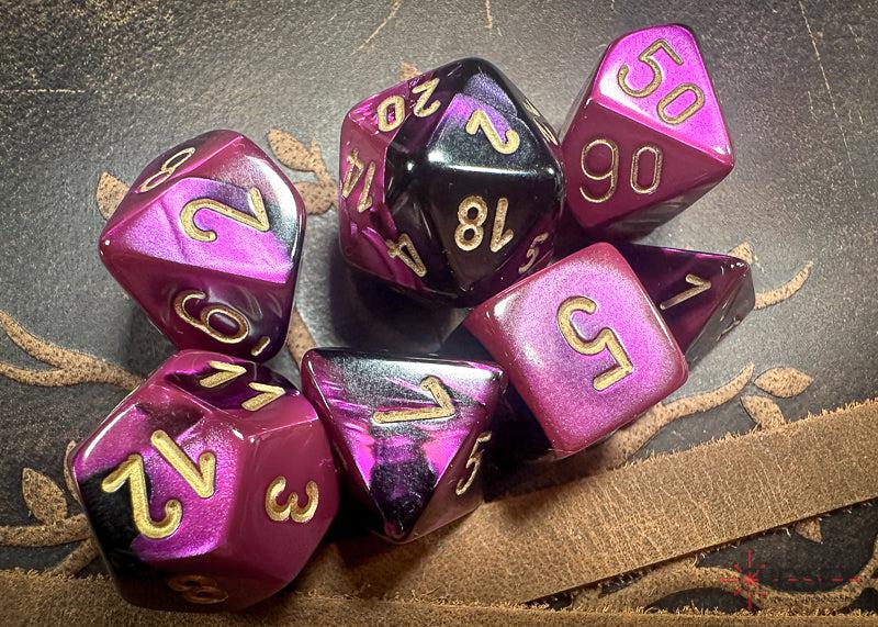 CHX26440 - Chessex: Gemini Black-Purple/gold Polyhedral 7-Dice Set