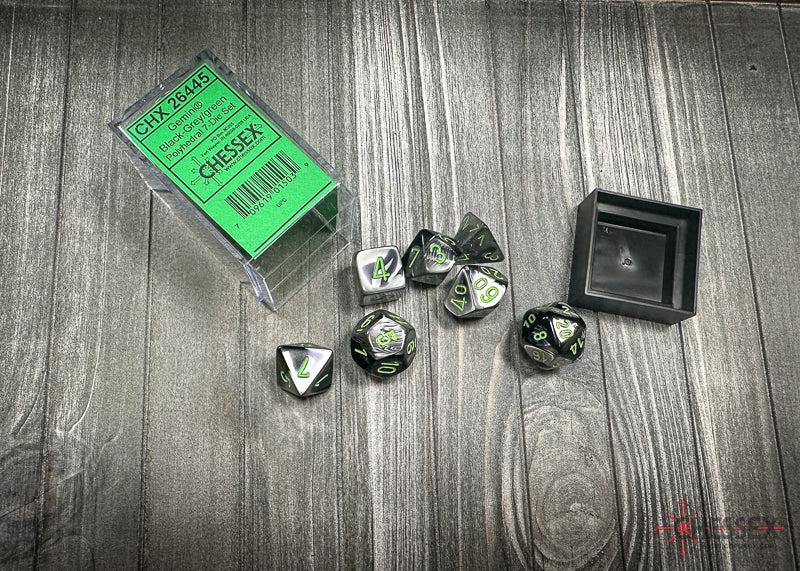 CHX26445 - Chessex: Gemini Black-Grey/green Polyhedral 7-Dice Set