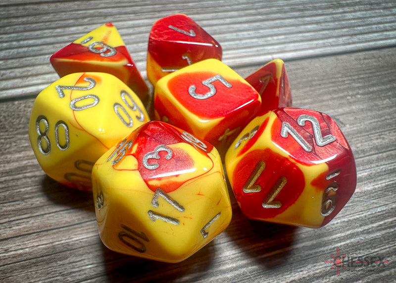 CHX26450 - Chessex: Gemini Red-Yellow/silver Polyhedral 7-Dice Set