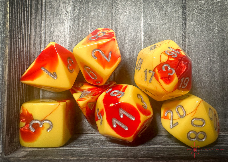 CHX26450 - Chessex: Gemini Red-Yellow/silver Polyhedral 7-Dice Set