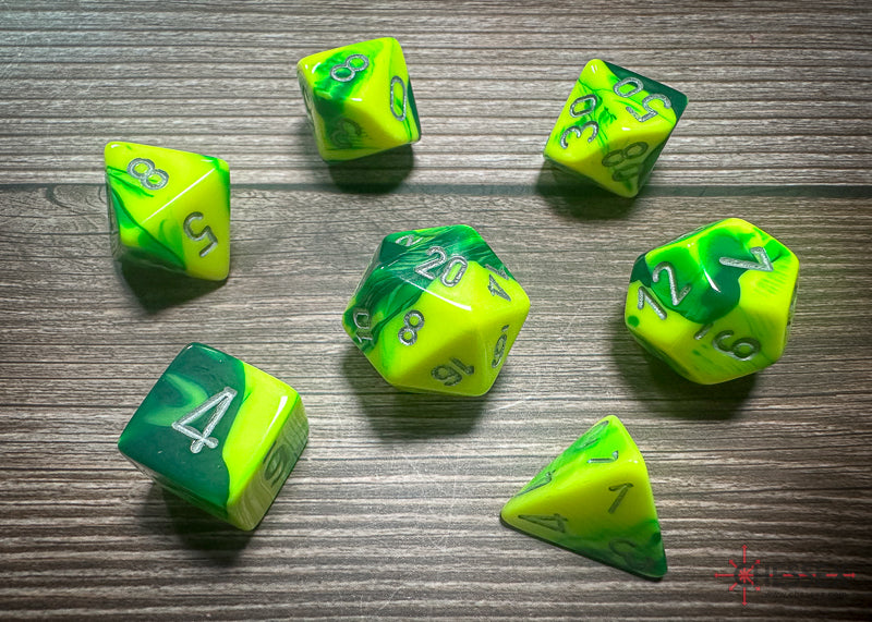 CHX26454 - Chessex: Gemini Green-Yellow/silver Polyhedral 7-Dice Set