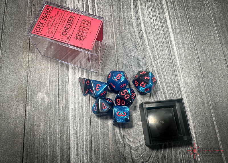 CHX26458 - Chessex: Gemini Black-Starlight/red Polyhedral 7-Dice Set