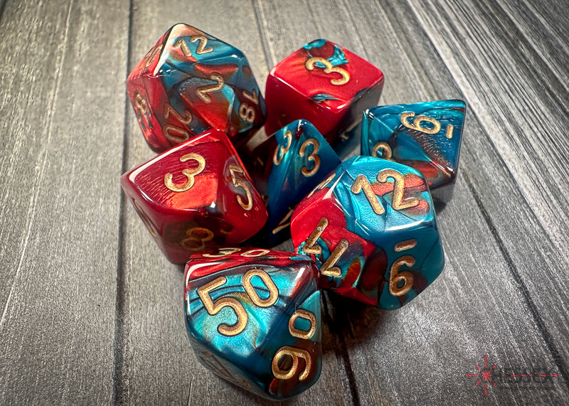 CHX26462 - Chessex: Gemini Red-Teal/gold Polyhedral 7-Dice Set