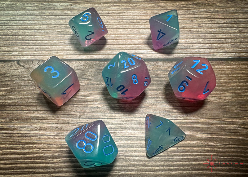 CHX26464 - Chessex: Gemini Gel Green-Pink/blue Luminary Polyhedral 7-Dice Set