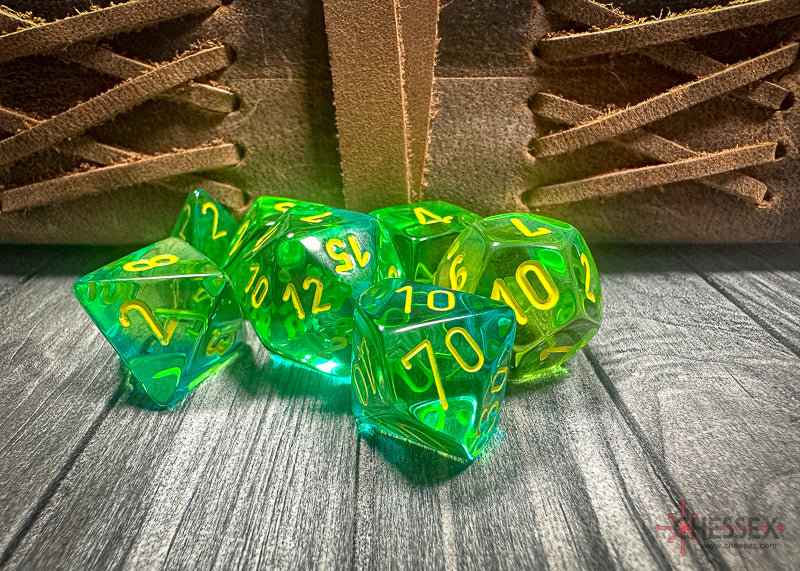 CHX26466 - Chessex: Gemini Translucent Green-Teal/yellow Polyhedral 7-Dice Set