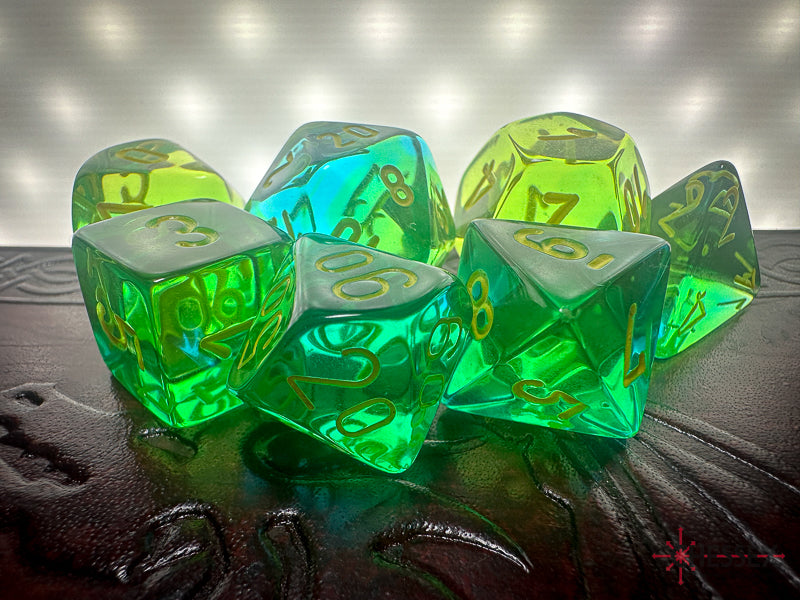 CHX26466 - Chessex: Gemini Translucent Green-Teal/yellow Polyhedral 7-Dice Set