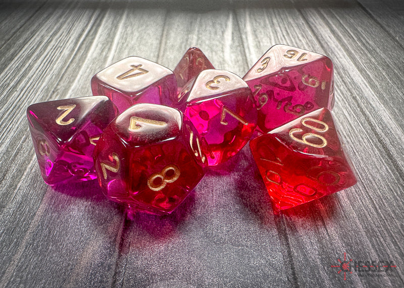 CHX26467 - Chessex: Gemini Translucent Red-Violet/gold Polyhedral 7-Dice Set