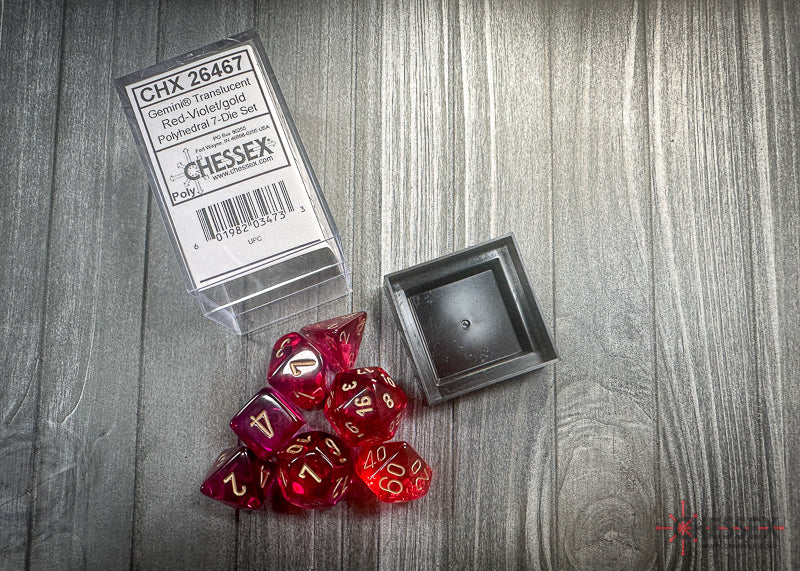 CHX26467 - Chessex: Gemini Translucent Red-Violet/gold Polyhedral 7-Dice Set