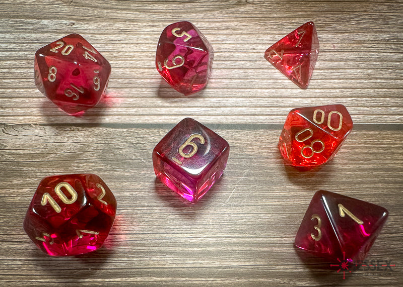 CHX26467 - Chessex: Gemini Translucent Red-Violet/gold Polyhedral 7-Dice Set