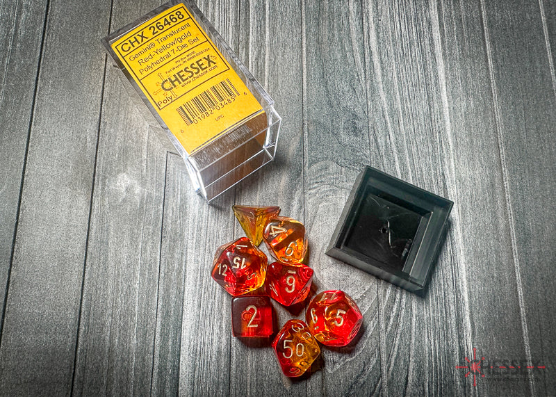 CHX26468 - Chessex: Gemini Translucent Red-Yellow/gold Polyhedral 7-Dice Set