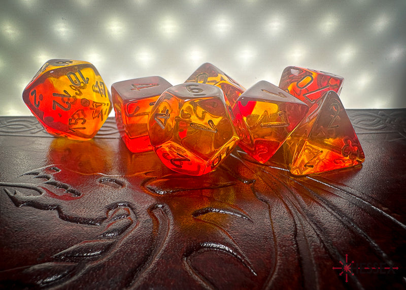 CHX26468 - Chessex: Gemini Translucent Red-Yellow/gold Polyhedral 7-Dice Set