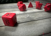 CHX25414 - Chessex: Opaque Red/black Polyhedral 7-Dice Set