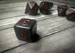 CHX25418 - Chessex: Opaque Black/red Polyhedral 7-Dice Set