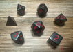 CHX25418 - Chessex: Opaque Black/red Polyhedral 7-Dice Set