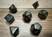 CHX25428 - Chessex: Opaque Black/gold Polyhedral 7-Dice Set