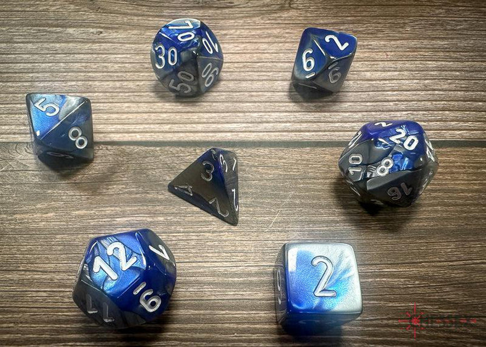 CHX26423 - Chessex: Gemini Blue-Steel/white Polyhedral 7-Dice Set