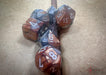 CHX26424 - Chessex: Gemini Copper-Steel/white Polyhedral 7-Dice Set